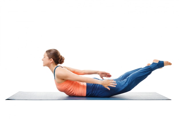 Premium Photo | Woman doing ashtanga vinyasa yoga asana salabhasana